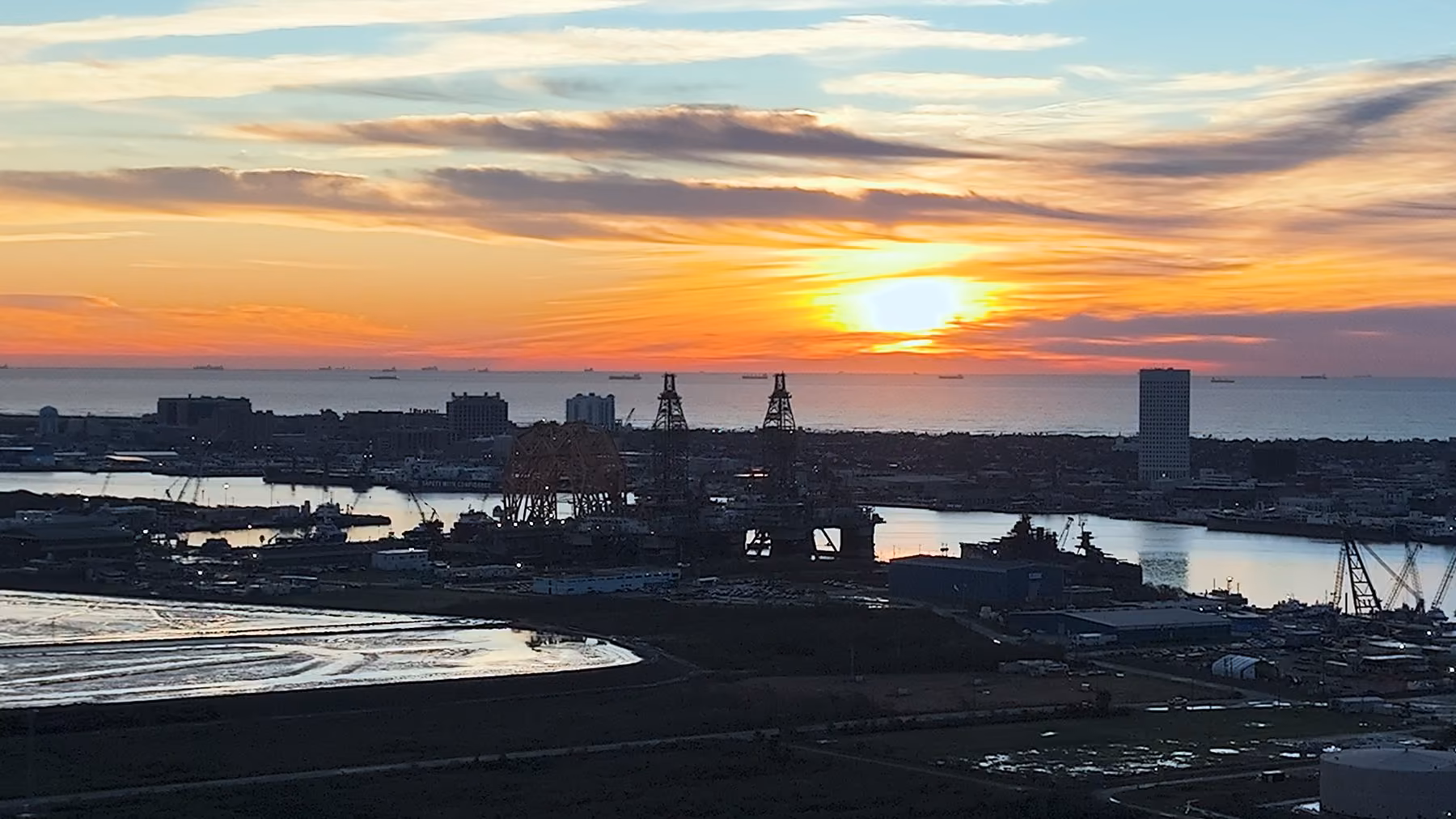 Warm sunset light across Galveston Harbor